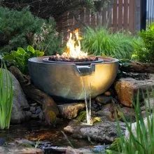 Fire and water spillway bowl, built by iPond and Landscapes