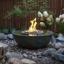 Fire bowl in the garden, built by iPond and Landscapes