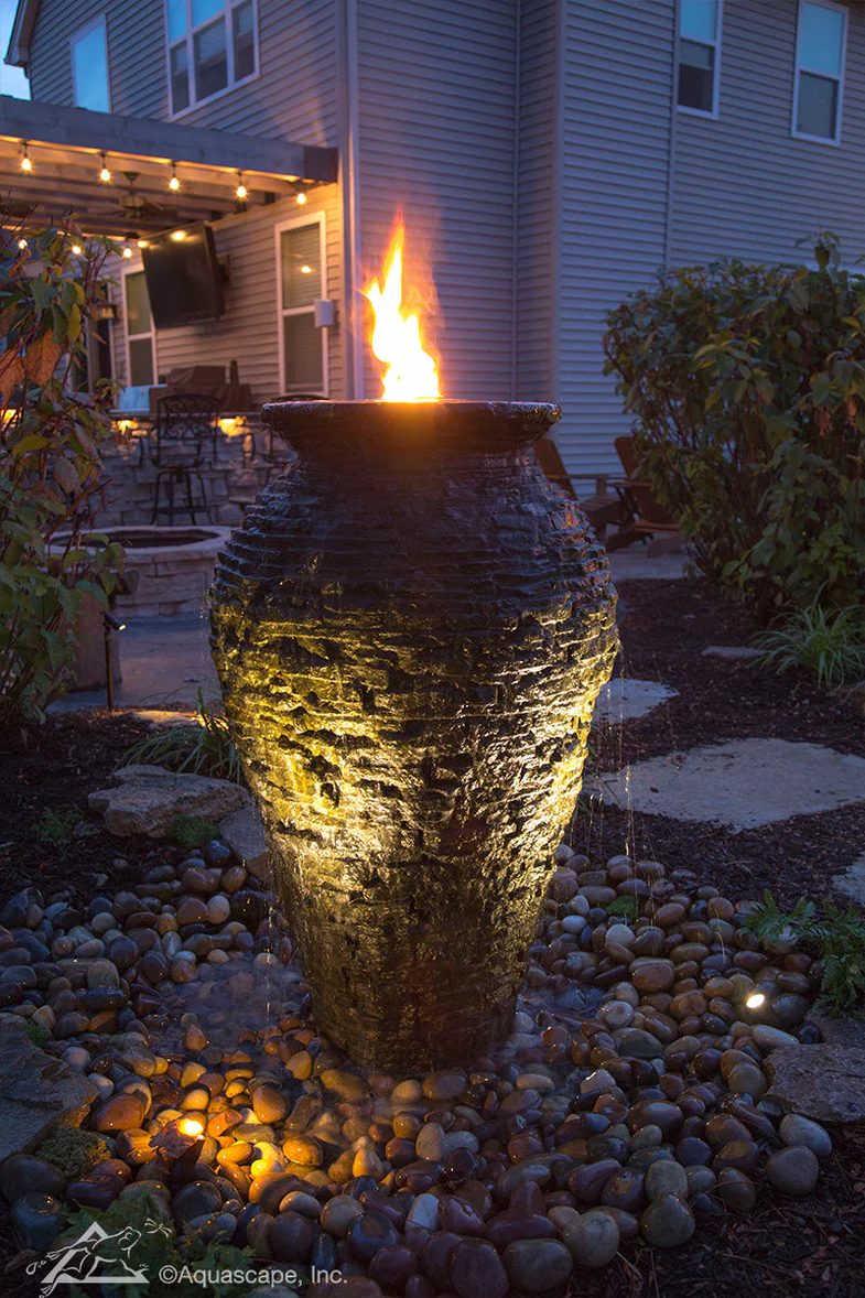 Fire and water urn at dusk, built by iPond and Landscapes