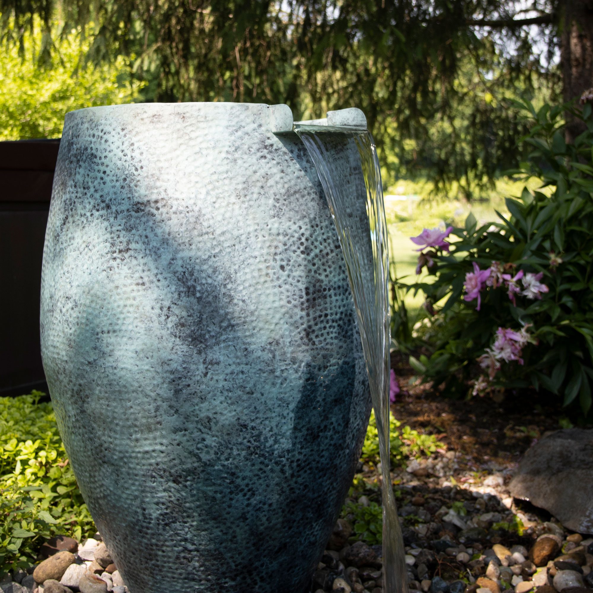 Blue glazed urn fountain, built by iPond and Landscapes