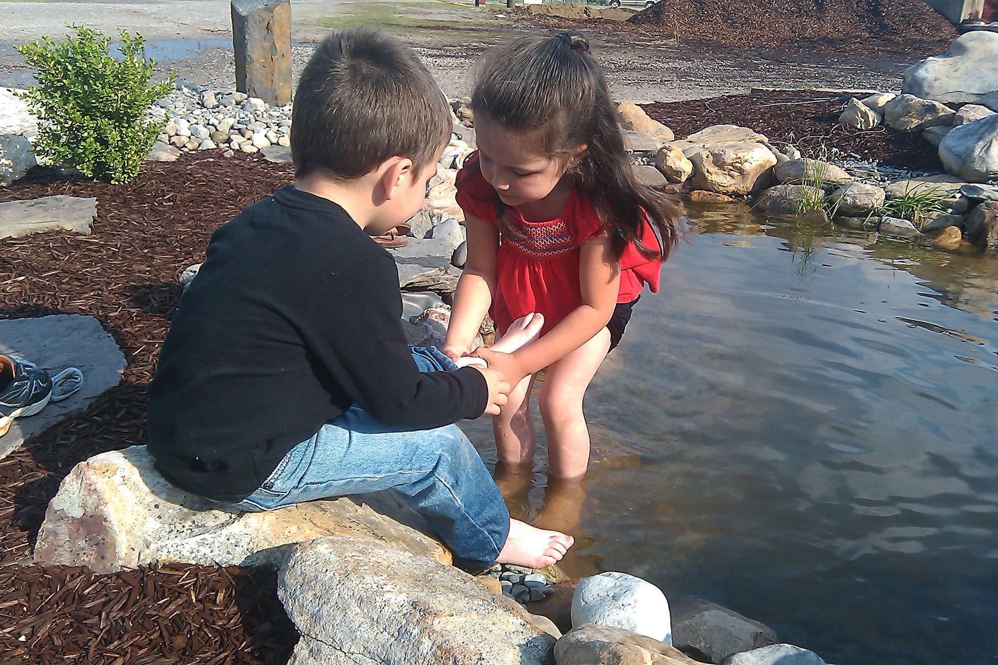 Jacob's kids at the pond, 2011, built by iPond and Landscapes
