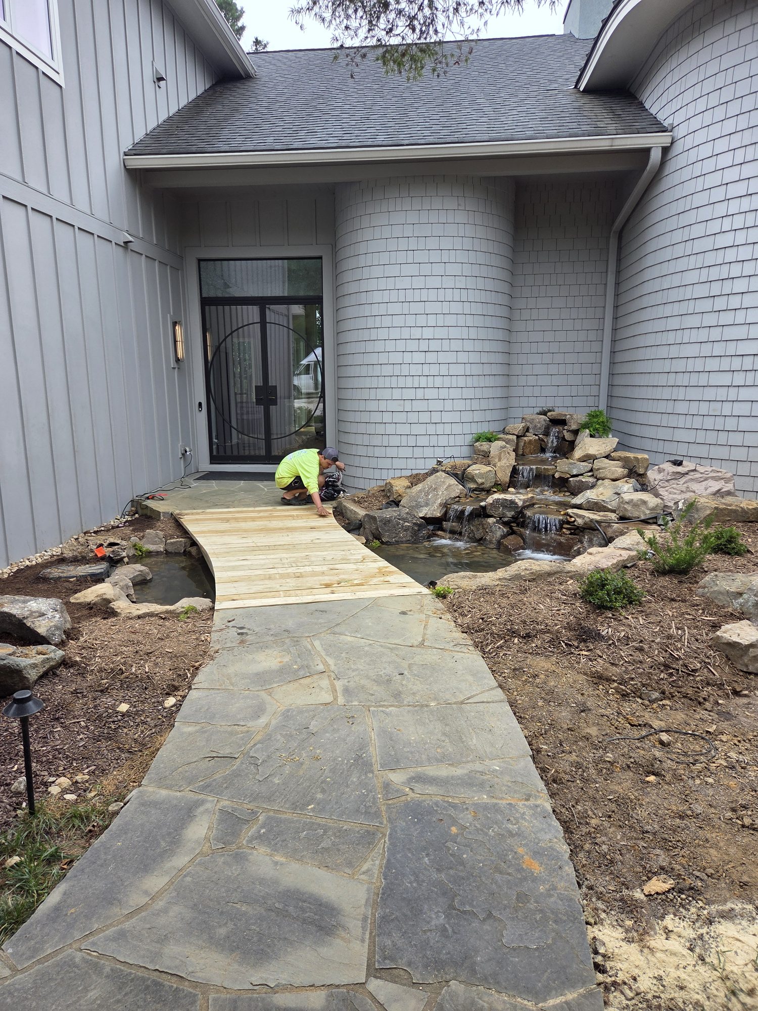 10x12 pond at the front entry, Raleigh, built by iPond and Landscapes