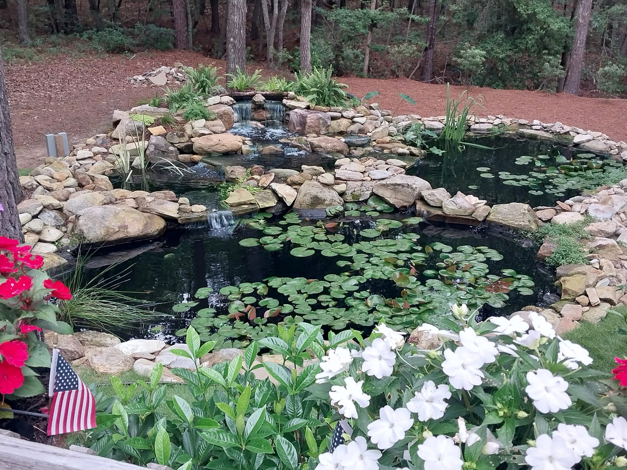 Triple waterfall pond, Southern Pines, built by iPond and Landscapes